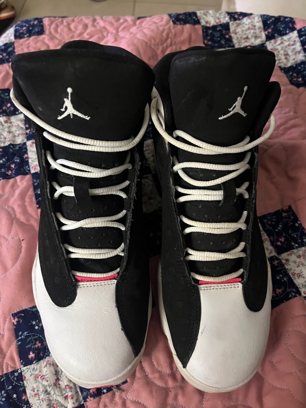 Jordan Black, Pink, and White High-Top Sneakers with Pink Accent
